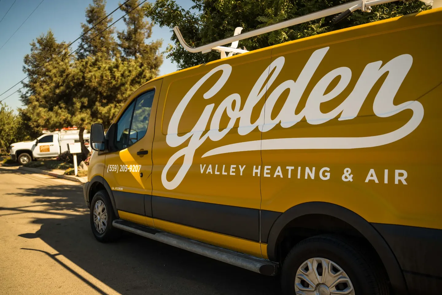 Golden Valley Heating and Air team and service vehicle at an HVAC job — photo 8